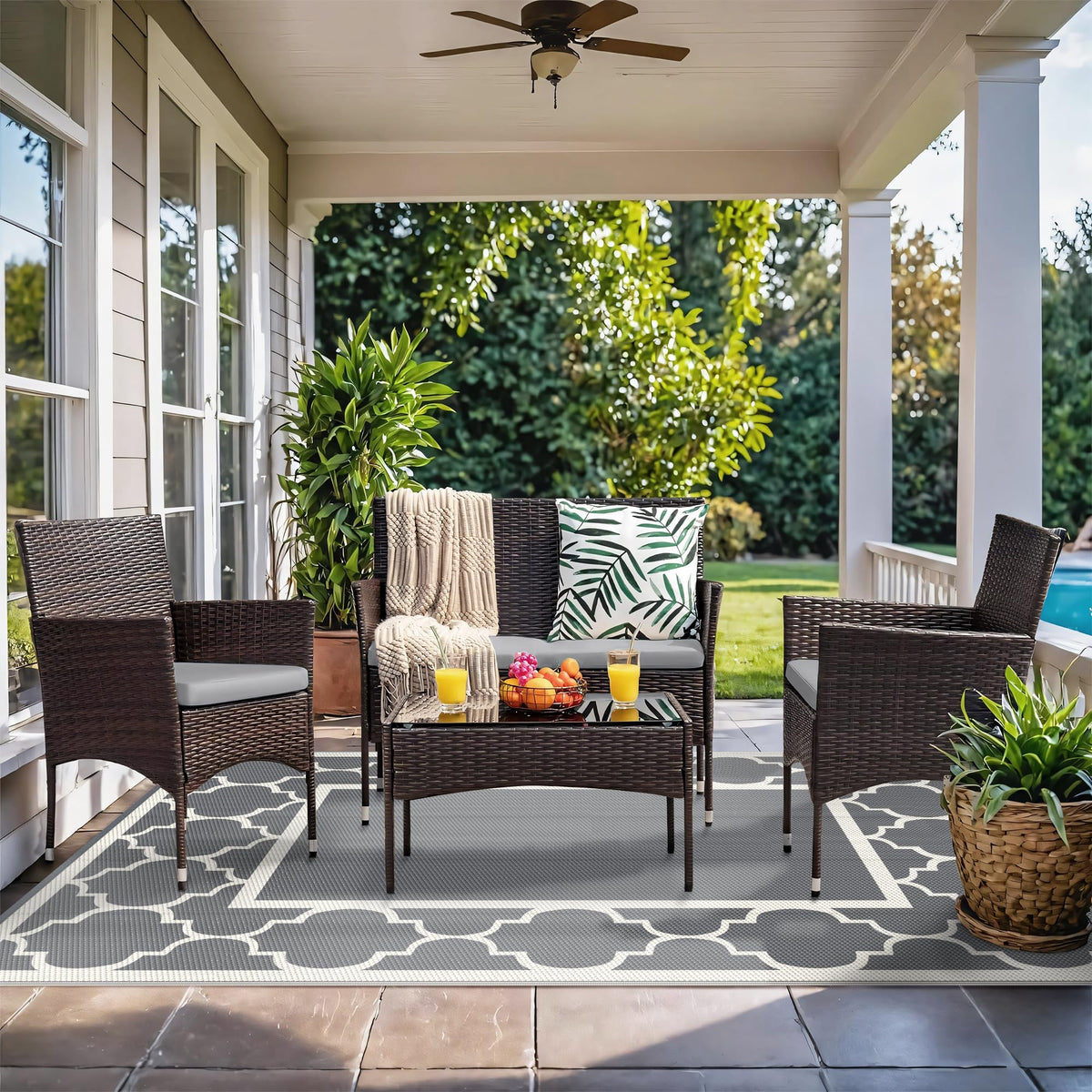 GENIMO reversible-pattern rug on terrace boosts indoor-outdoor versatility.