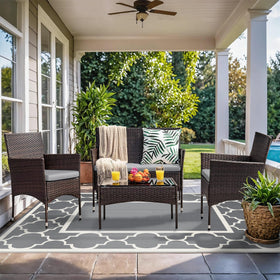 GENIMO reversible-pattern rug on terrace boosts indoor-outdoor versatility.