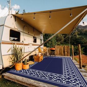GENIMO rug with diamond-frame design adds modern elegance to outdoor spaces.