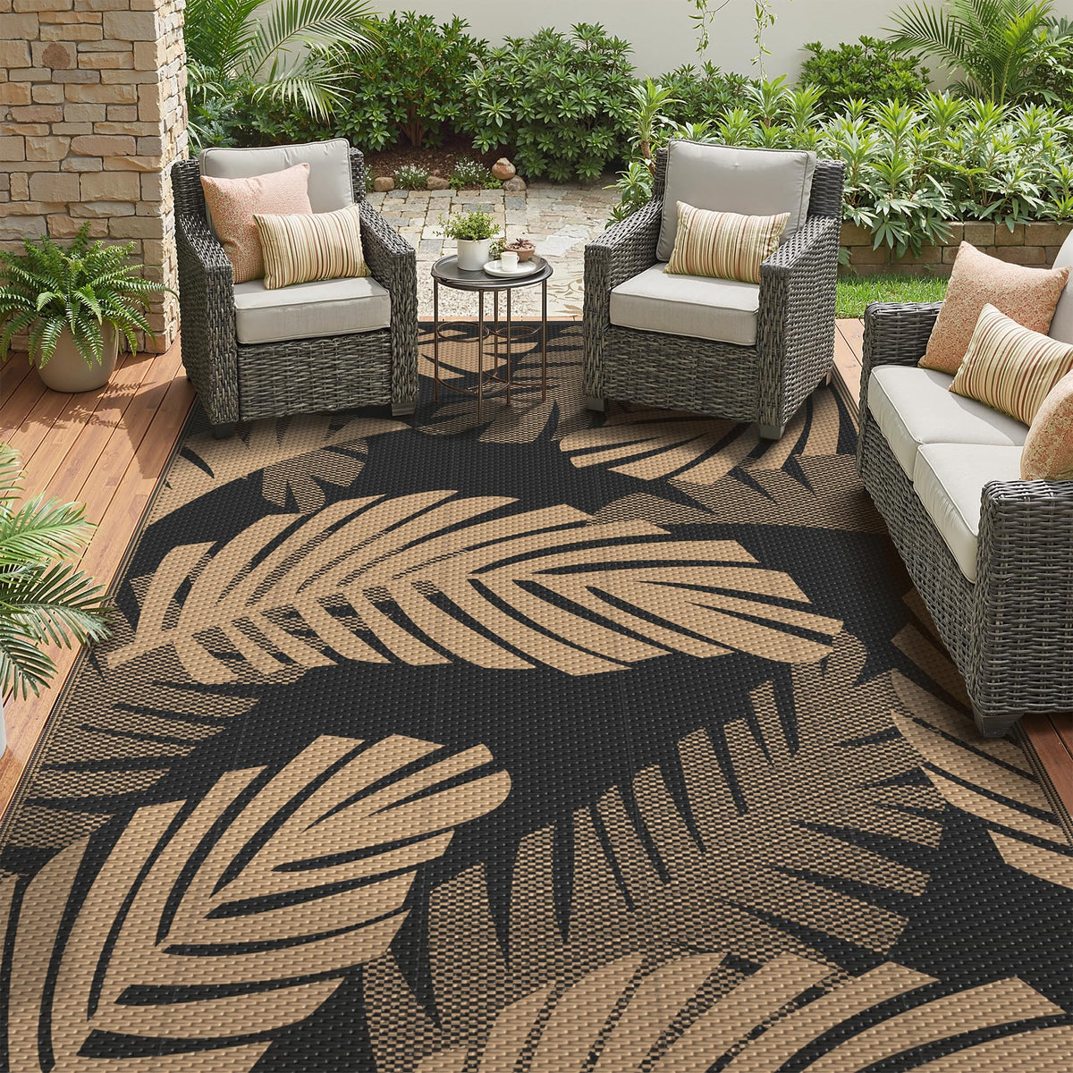 GENIMO palm-leaf outdoor rug front view, durable and easy to clean for patio or camp.