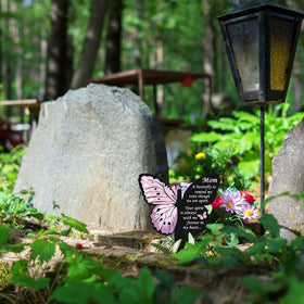 Geosar garden grave decoration adds sentimental charm to yard displays.