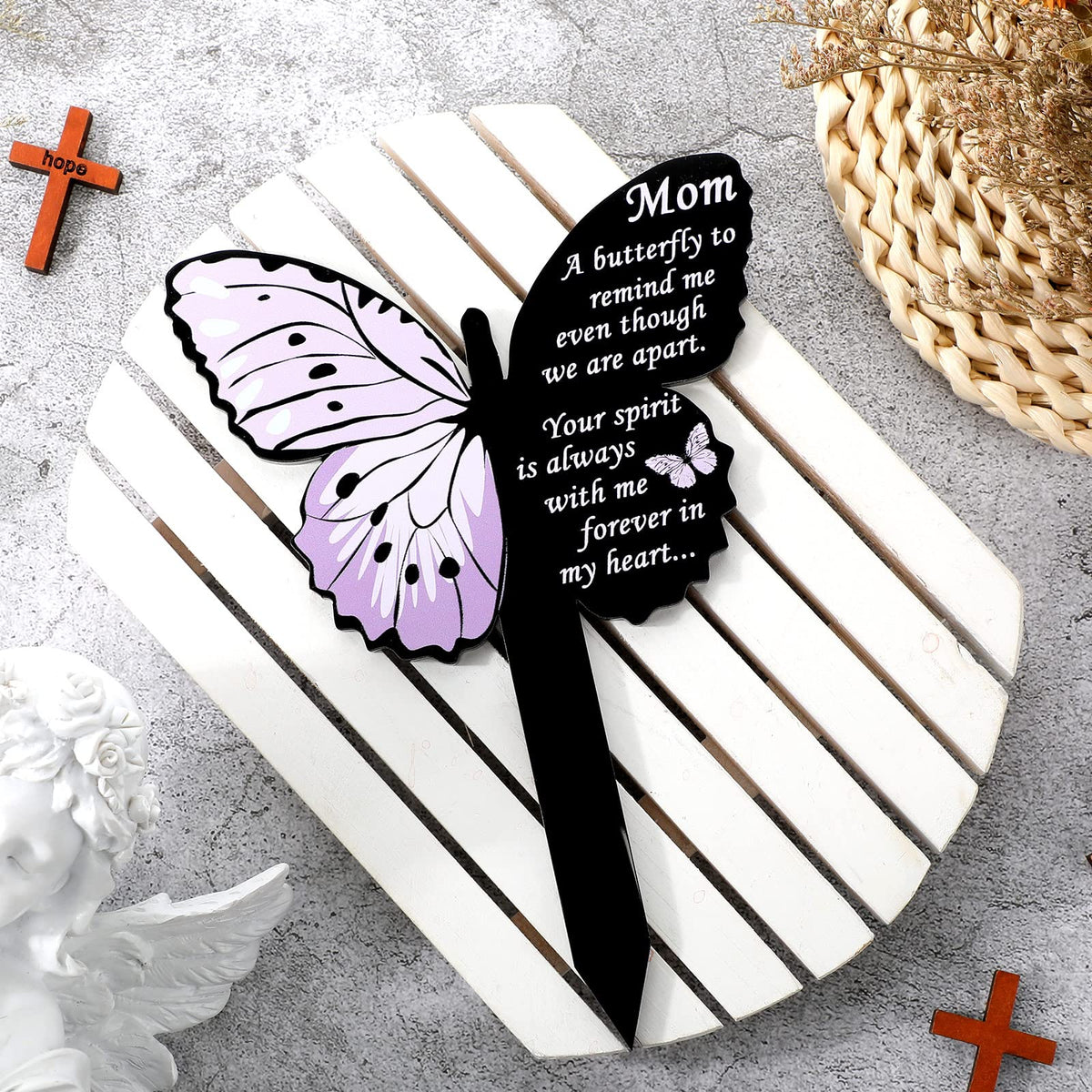 Geosar butterfly memorial stake resists rain and wind for lasting remembrance.
