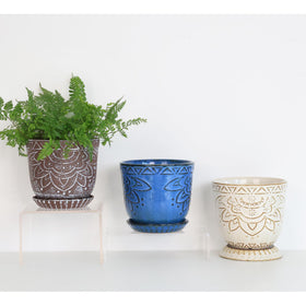 Gepege beaded planters pair on a table show cohesive decor.