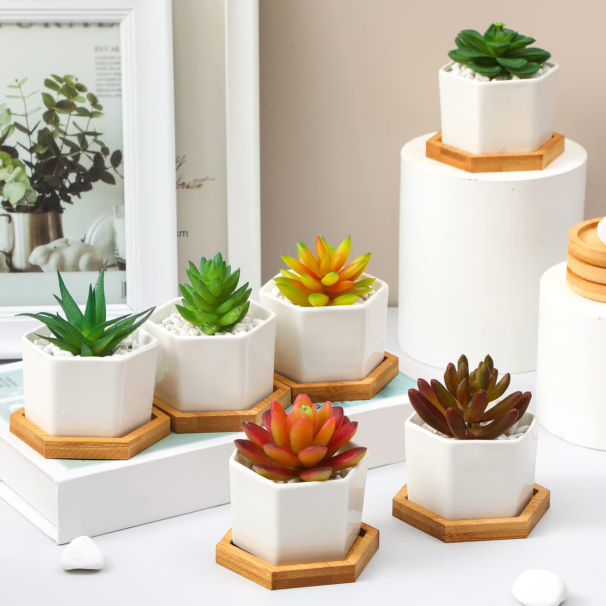 Gerrii white ceramic planter on a desk for modern office aesthetics