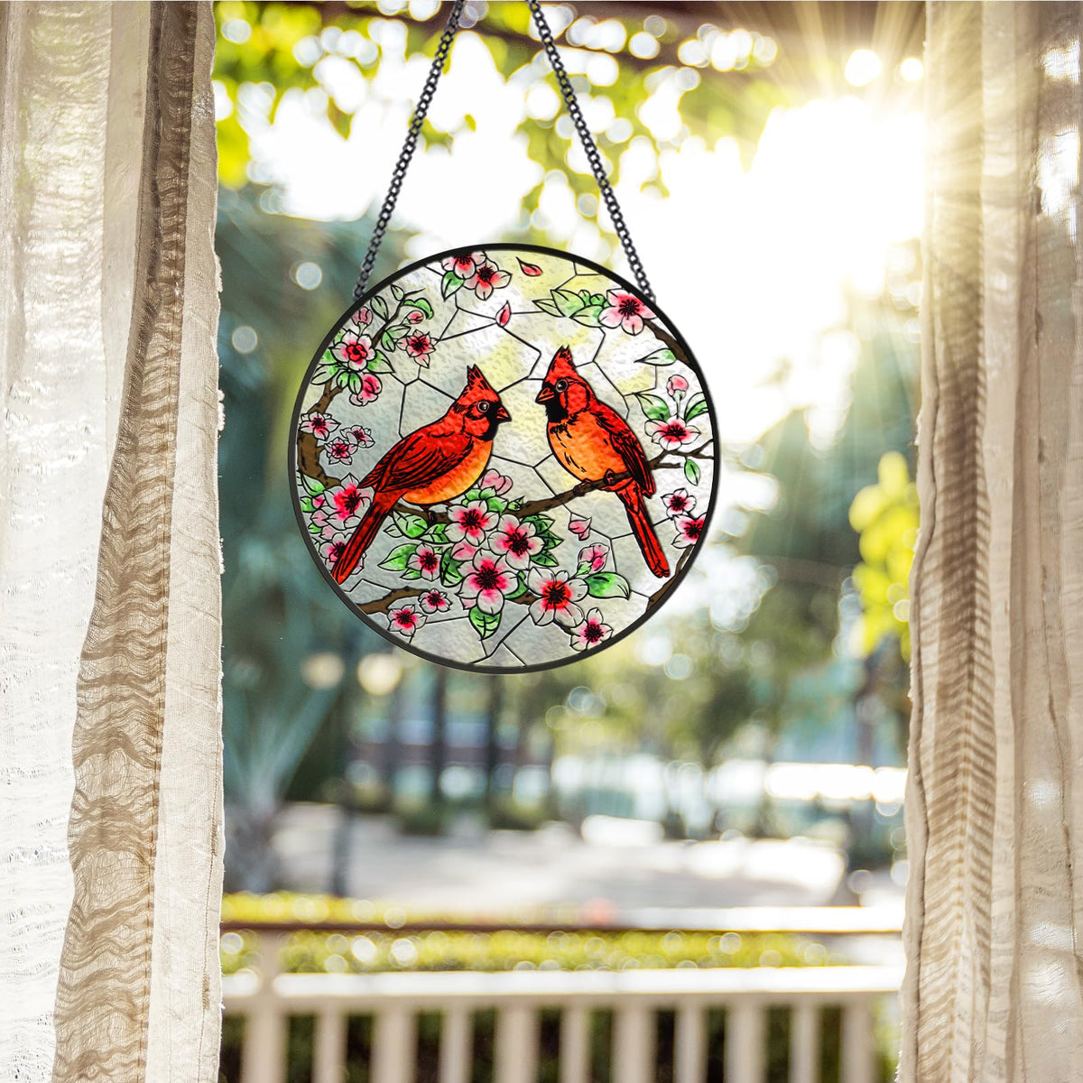 Gerute sun catcher includes metal chain for easy hanging in windows or walls.
