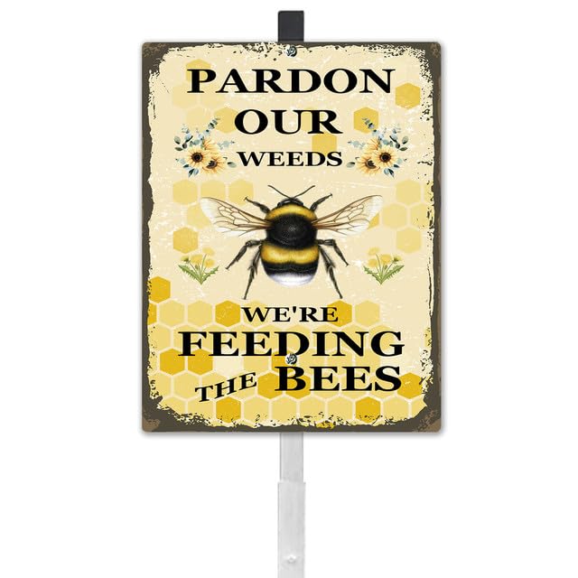 GETTOGET Parden Our Weeds We Are Feeding The Bees yard sign with stake, visible from afar.