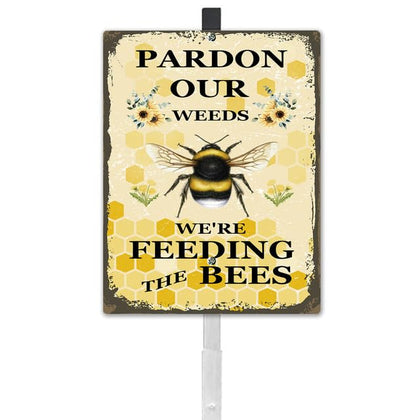 GETTOGET Parden Our Weeds We Are Feeding The Bees yard sign with stake, visible from afar.