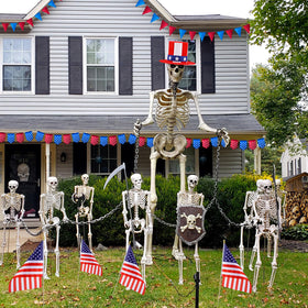 Geyoga outdoor lawn display with large skeleton hat creates festive ambiance.