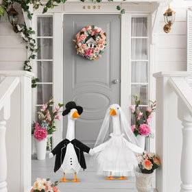 Geyoga wedding veil completes the bridal look on a lawn goose.