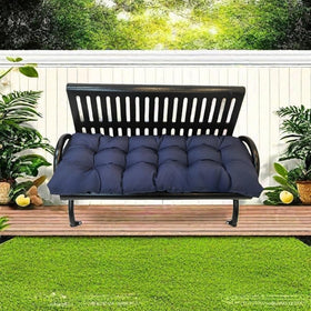 Gfgift navy cushion on wicker lounger for versatile outdoor use.
