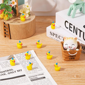 GGSTDDUP tiny ducks used as cake toppers for celebrations