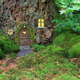 Gift Boutique fairy window adds daylight detail to planters.