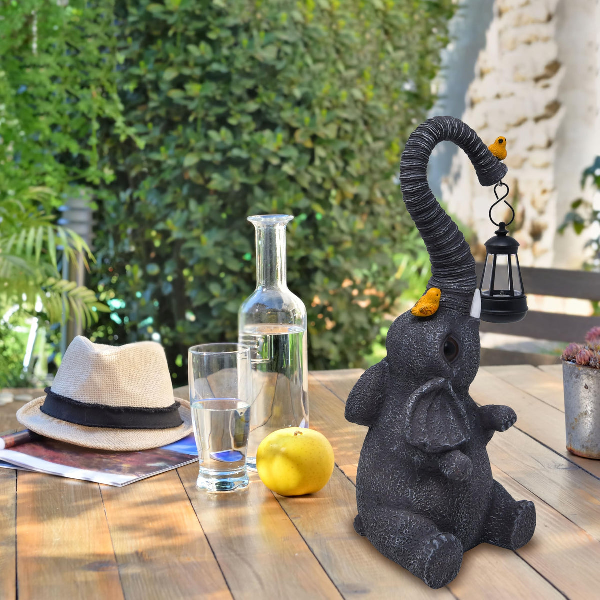 Gift Boutique whimsical elephant garden ornament creates visual interest