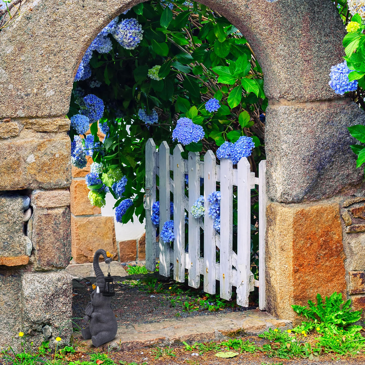 Gift Boutique yard elephant sculpture enhances flower beds and walkways