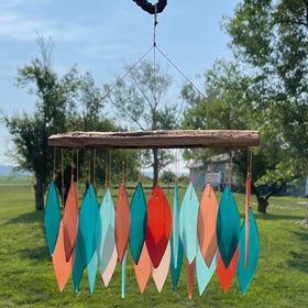 Gift Essentials wall decor wind chime adds a gentle focal point.
