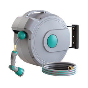 GILBEST retractable hose reel on a wall with 100 ft reach for easy watering.
