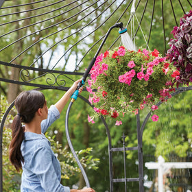 Gilmour kink-reducing wand helps you keep the hose straight while reaching hanging baskets.