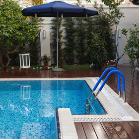 Professional-looking Ginchain handrail cover adds a premium touch to luxury pools.