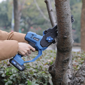 G LAXIA compact tool cutting in tight spaces during yardwork.
