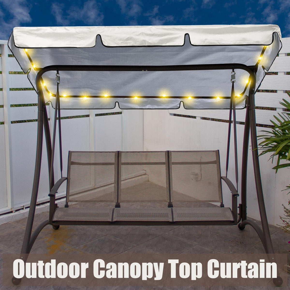 GliCraft LED canopy casting night ambience on a patio setting