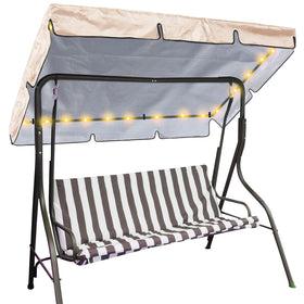 GliCraft LED porch swing canopy beige in use over a 2-3 seat swing, cozy outdoor shade