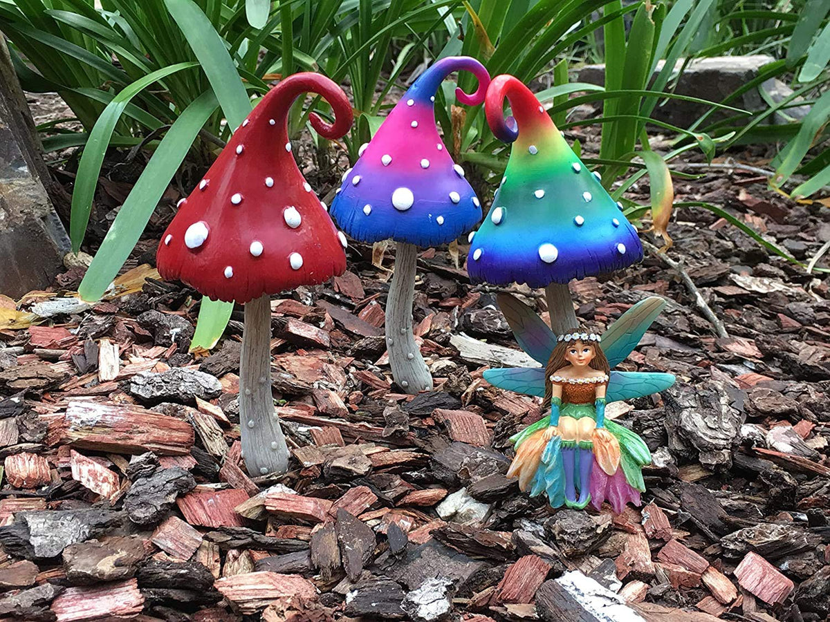 GlitZGlam Daisy resin fairy, non-toxic and durable for outdoor enjoyment.
