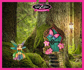 GlitZGlam Daisy fairy perched on rock, ideal for fairy garden accents.