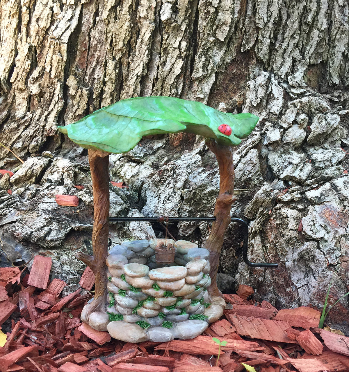 GlitZGlam hand-painted miniature well features artisan details for shelves or gardens.
