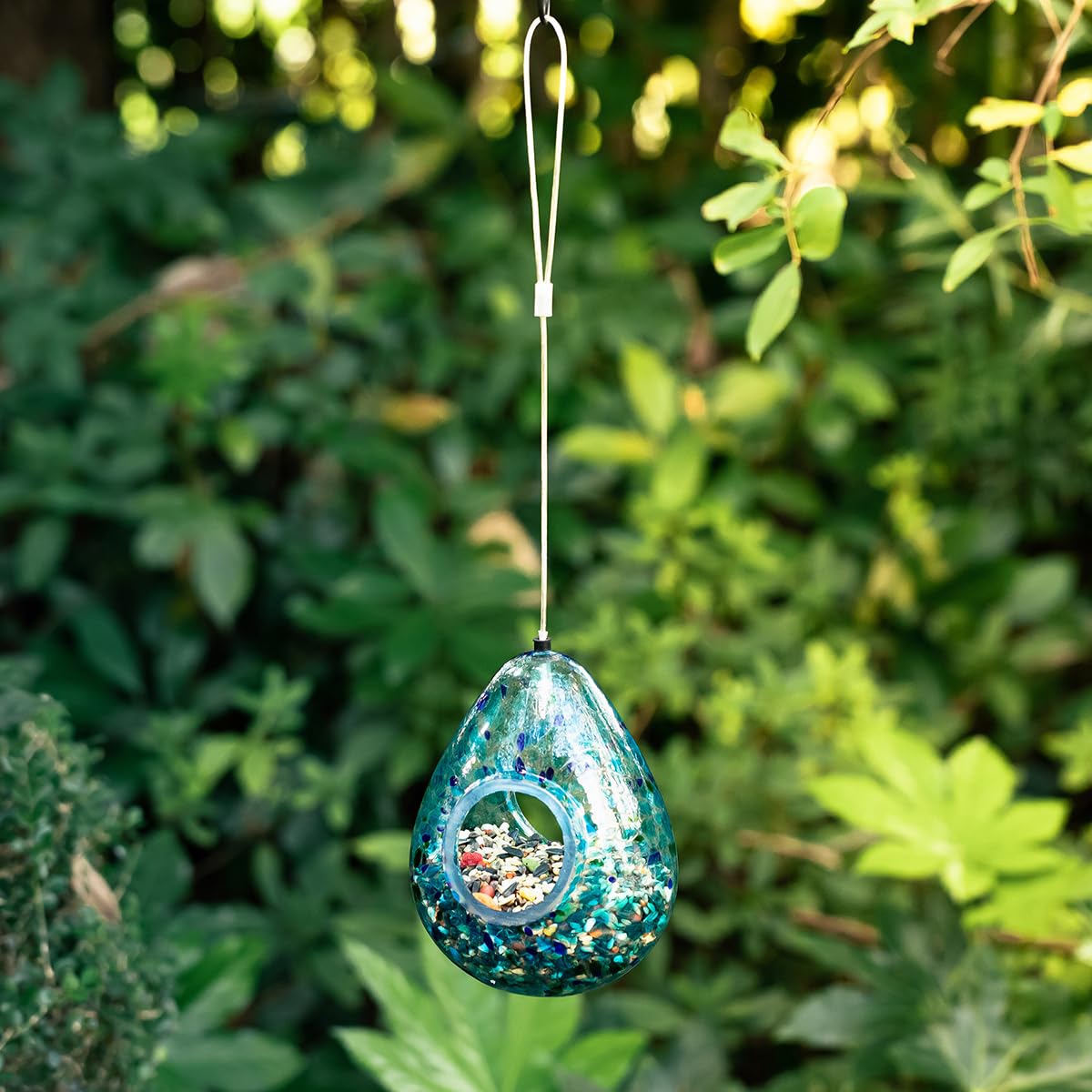 Glitzhome bird feeder attracts cardinals, bluebirds, and finches.