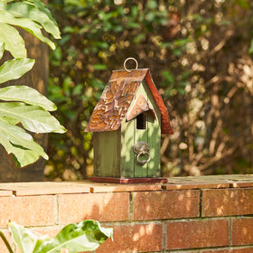Glitzhome 3D cottage details create a charming garden focal point.