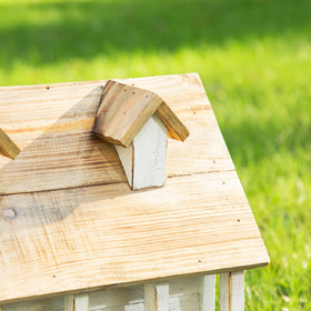 Glitzhome birdhouse wood and metal construction for durability.