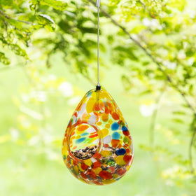 Glitzhome water drop birdfeeder outdoors, colorful garden birds.