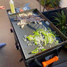Glowye outdoor-ready griddle top suitable for camping, tailgating, and patio cooking.