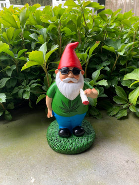 Gnometastic garden gnome on porch adds whimsy to lawns.
