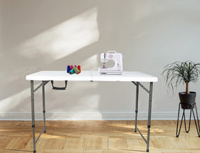 Go-Trio folding table folded compactly to save space and store