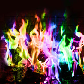 Gofire Color Flame Packets producing vivid colors in a fire pit.
