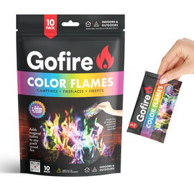 Gofire Color Flame Packets coloring an outdoor fire pit at night.