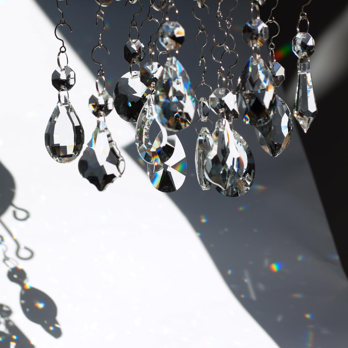 GOLDENHAITAI K9 crystal prisms in varied shapes add sparkling detail to decor.