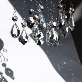 GOLDENHAITAI K9 crystal prisms in varied shapes add sparkling detail to decor.
