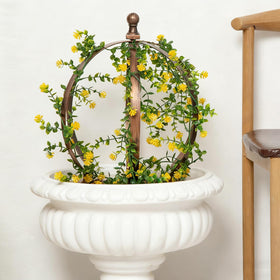 Goooxim lightweight outdoor trellis obelisk moves easily.