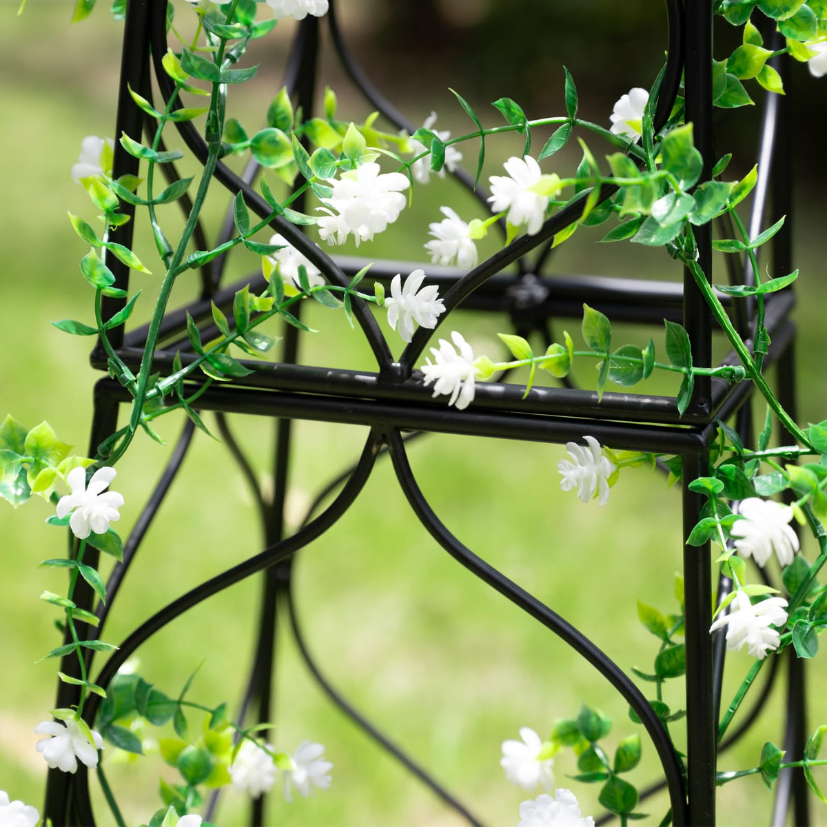 Goooxim Obelisk Trellis black finish endures weather while staying stylish.