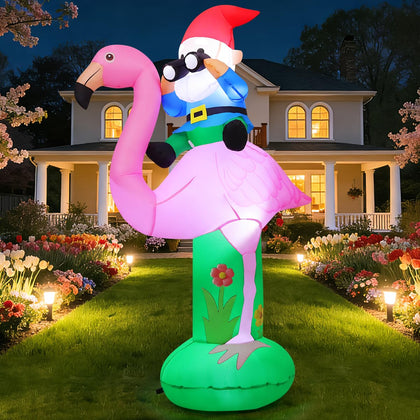GOOSH inflatable flamingo 6ft outdoors with LED glow for backyard use.