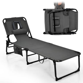 Goplus tanning chair with face-hole open for comfortable prone sunbathing.