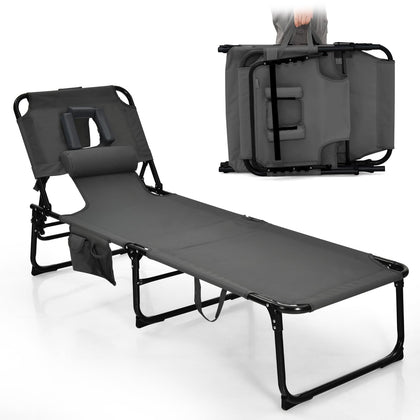 Goplus tanning chair with face-hole open for comfortable prone sunbathing.