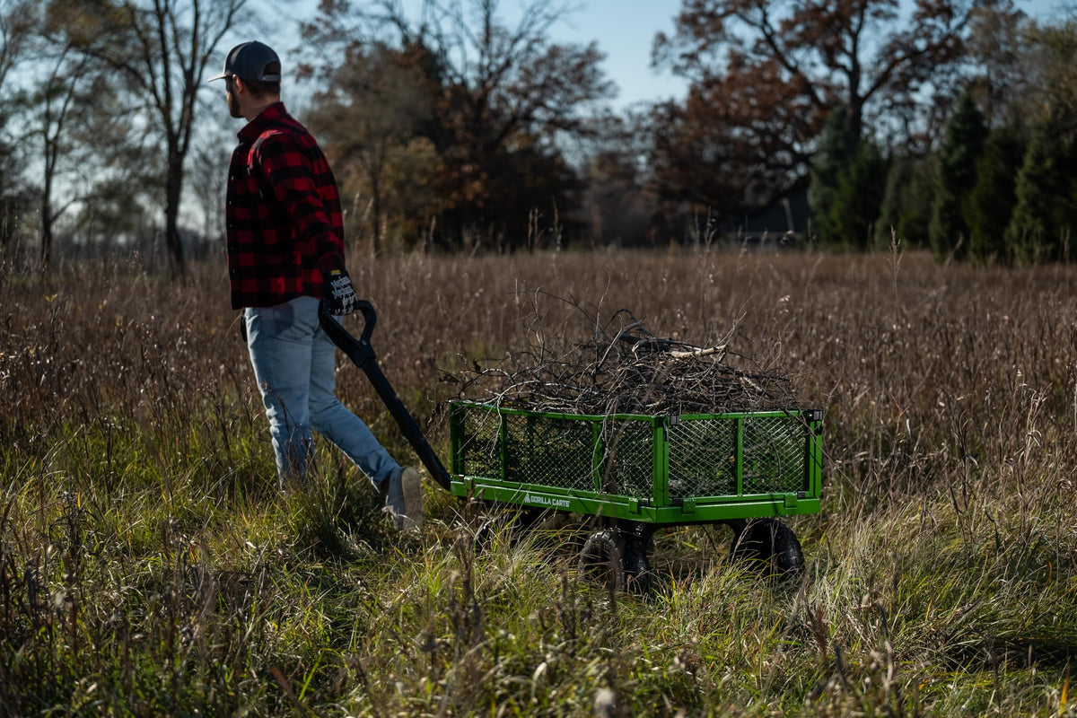 Gorilla Carts 2-in-1 handle enables easy manual use or towing behind equipment.