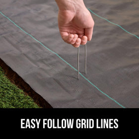 Water-permeable barrier allowing drainage through GORILLA GRIP weed fabric.