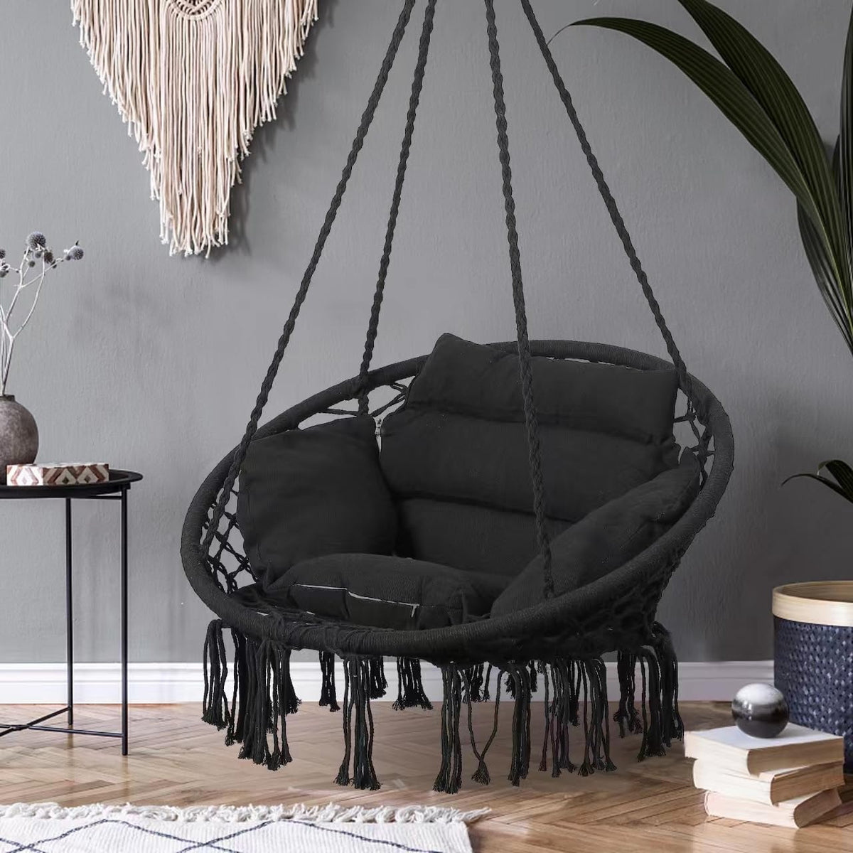 Goutime hammock chair in black complements any outdoor area.