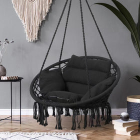Goutime hammock chair in black complements any outdoor area.
