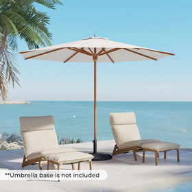 Grand Patio poolside-ready umbrella provides shade for lounge areas.