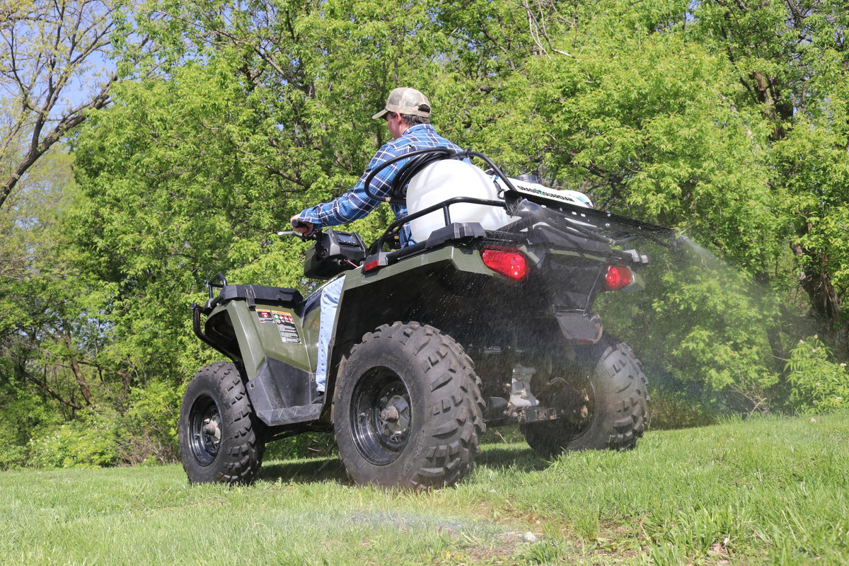 Grass Guardian ATV sprayer spot spray gun reaches 18 ft up and 20 ft across.